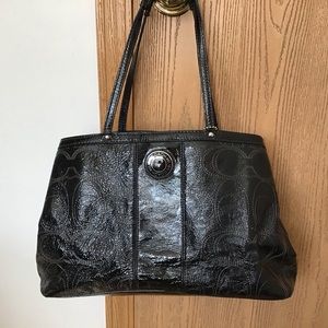 Coach black patent leather logo bag